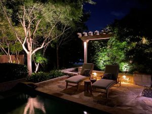 Pool lighting ideas such as lighting up these patio chairs are great for summer entertaining