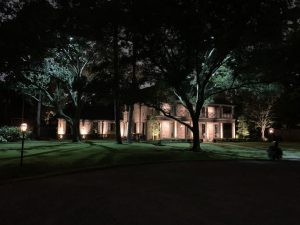 A two story brick memorial villages houston home sits on a large lot surrounded by trees A two story brick memorial villages houston home sits on a large lot surrounded by trees