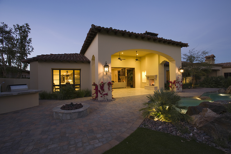Illuminated house exterior against clear sky at twilight. Lighting Trends in Houston