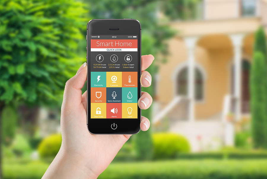 homeowner using smart outdoor lighting on phone