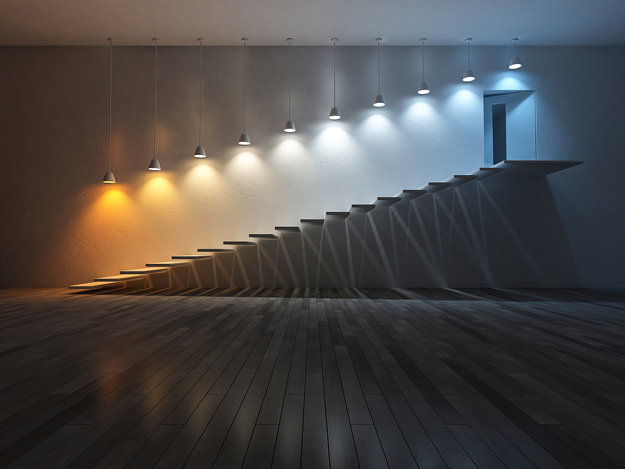 Color temperature scale image showing warm to cool lighting tones with labeled kelvin values and watts for lighting comparison.