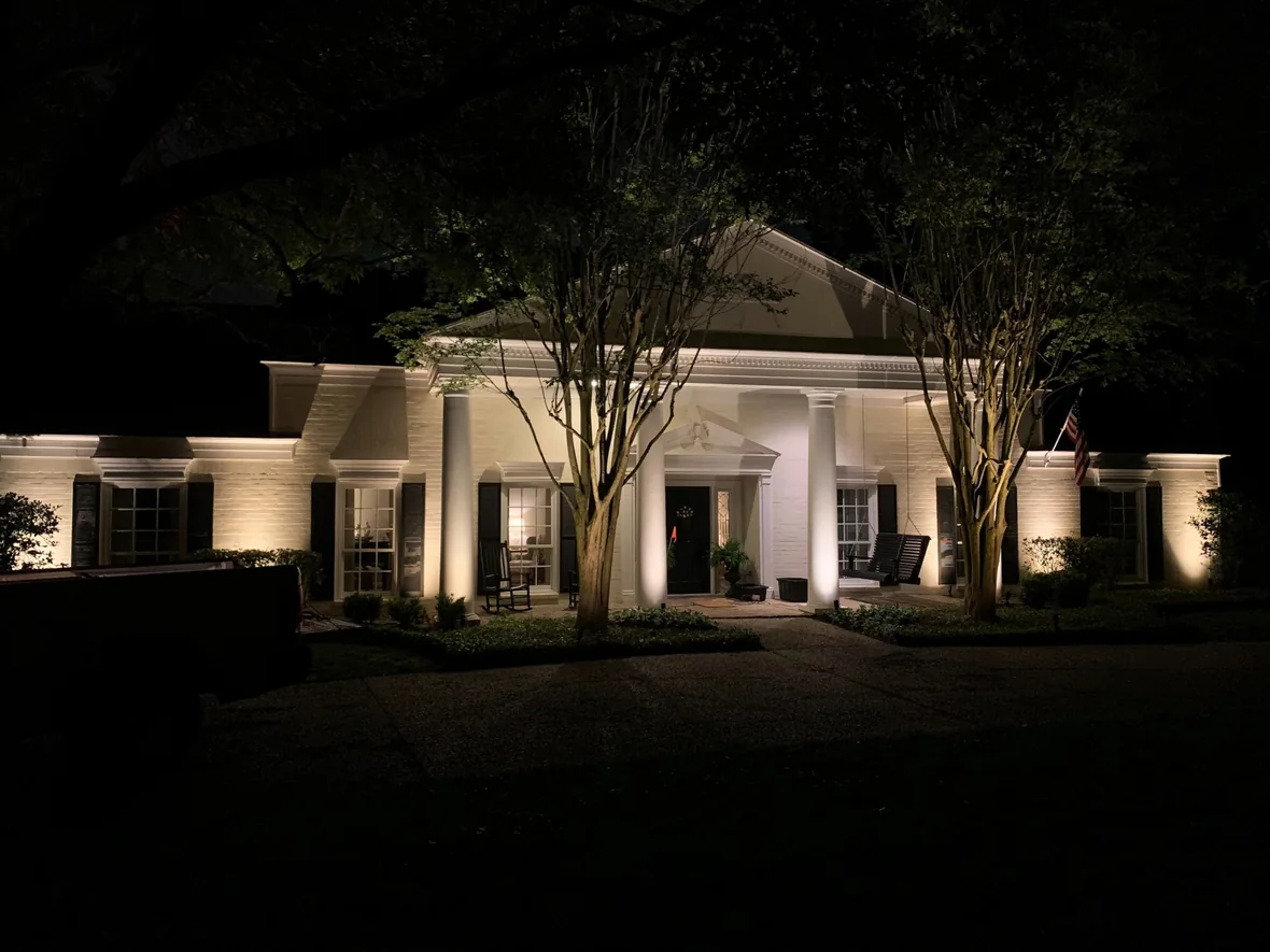 Colonnade and entrance of a commercial building lit from below